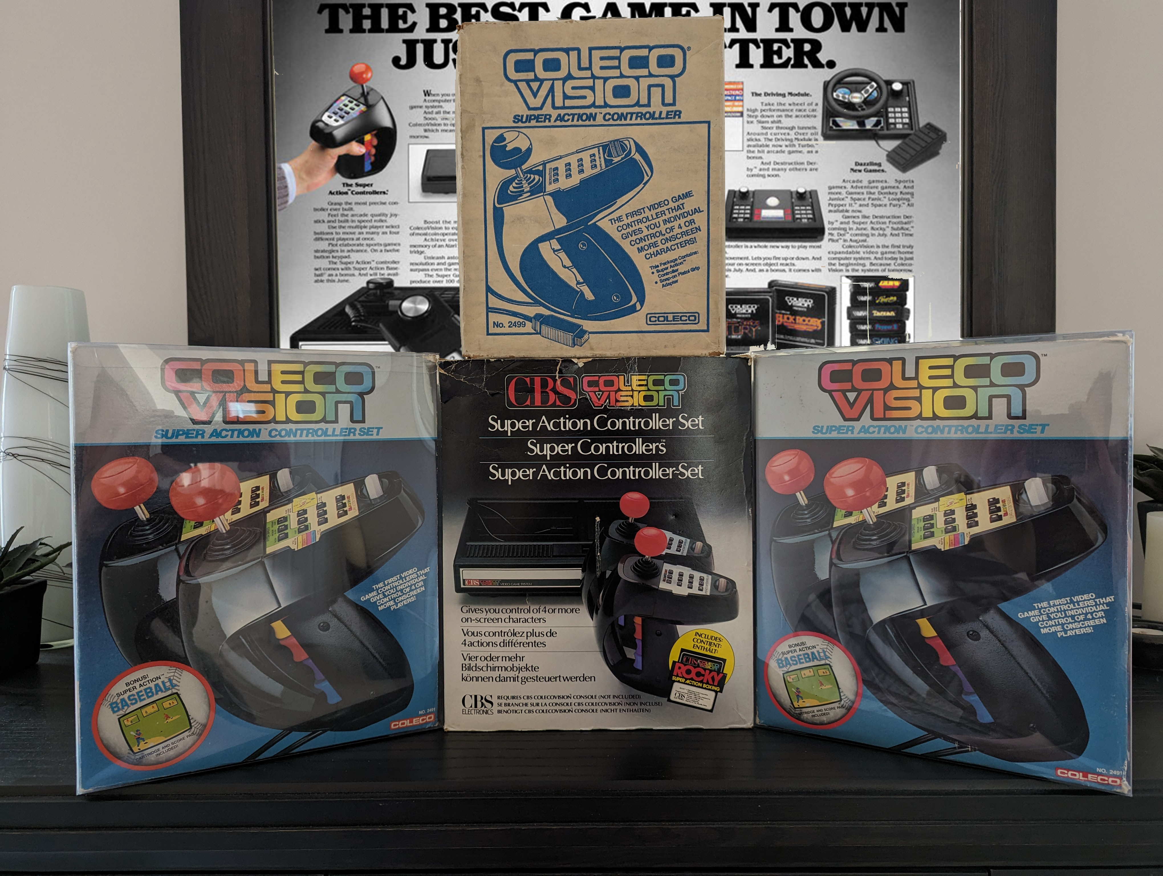 ColecoVision SuperAction Controller Set showing pair of boxing glove-style controllers with joysticks and keypads